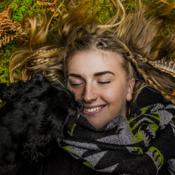 blond woman with puppy